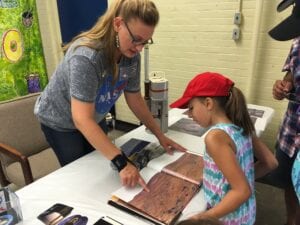 Decked out in a NASA T-shirt and solar system earings, Zoe Ponterio is the right person to ask if you have any space-related questions. Ponterio manages the Spacecraft Planetary Imaging Facility (SPIF) on the Cornell University campus and often visits local classrooms to teach students more about the science of space.