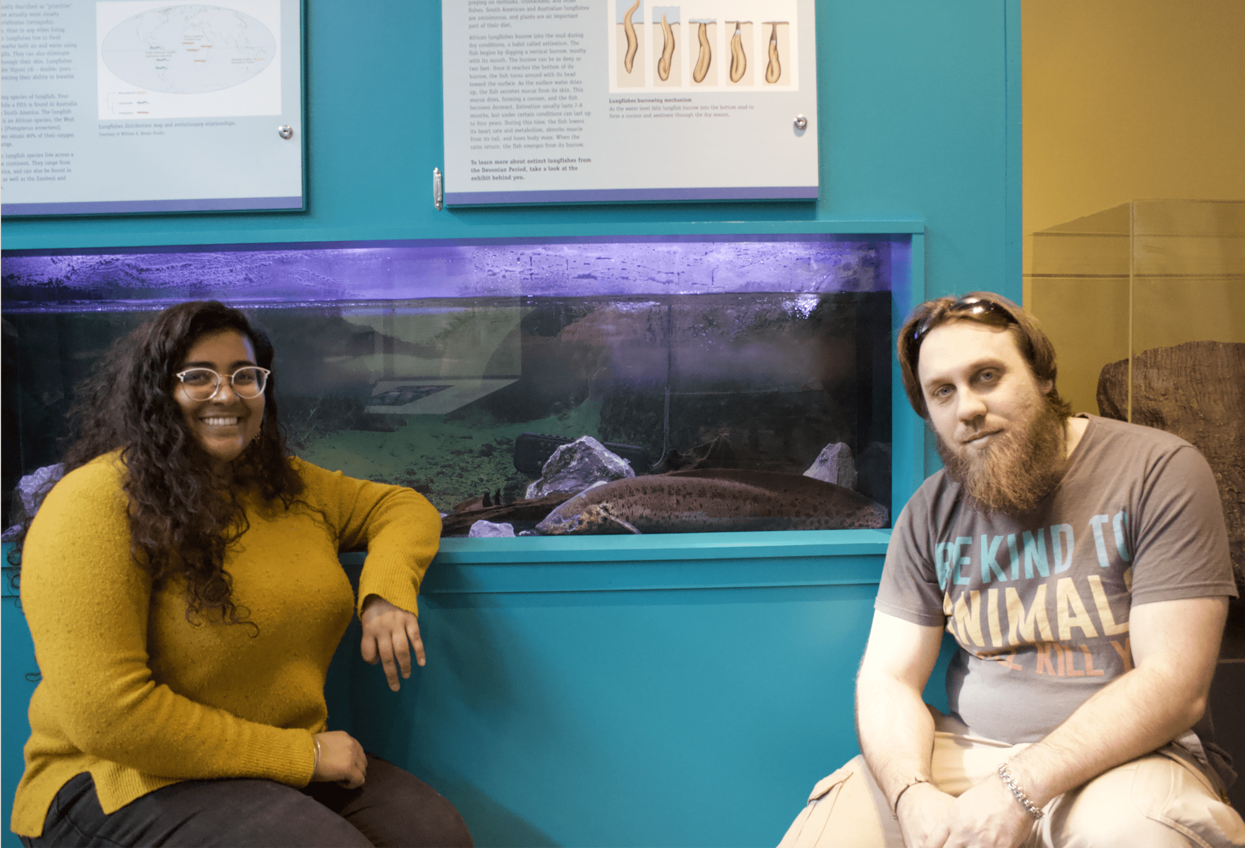 Shyia Magan (left) and Chris Wolfe (right) with Tembea, the new addition to the Museum of the Earth's Devonian Period exhibit.
