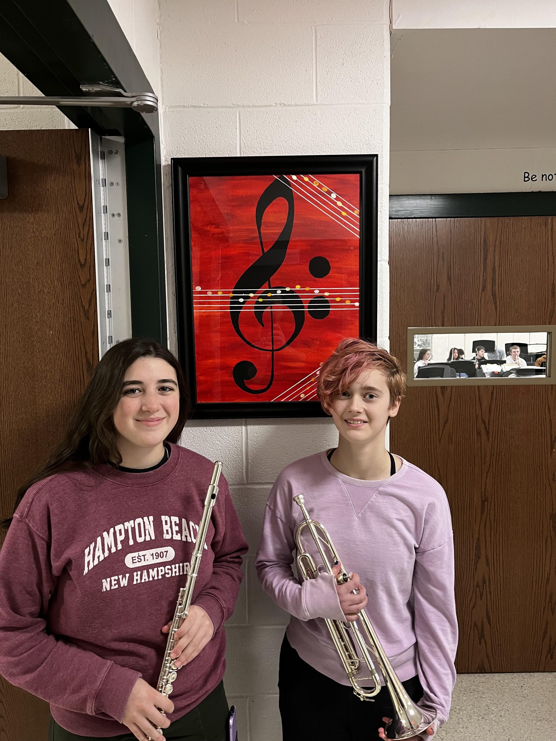 Newfield High School junior Angelina Masotti (left) and sophomore Winter Gaspari were selected to perform in the New York State Schools Music Association [NYSSMA] Area-All State Band,