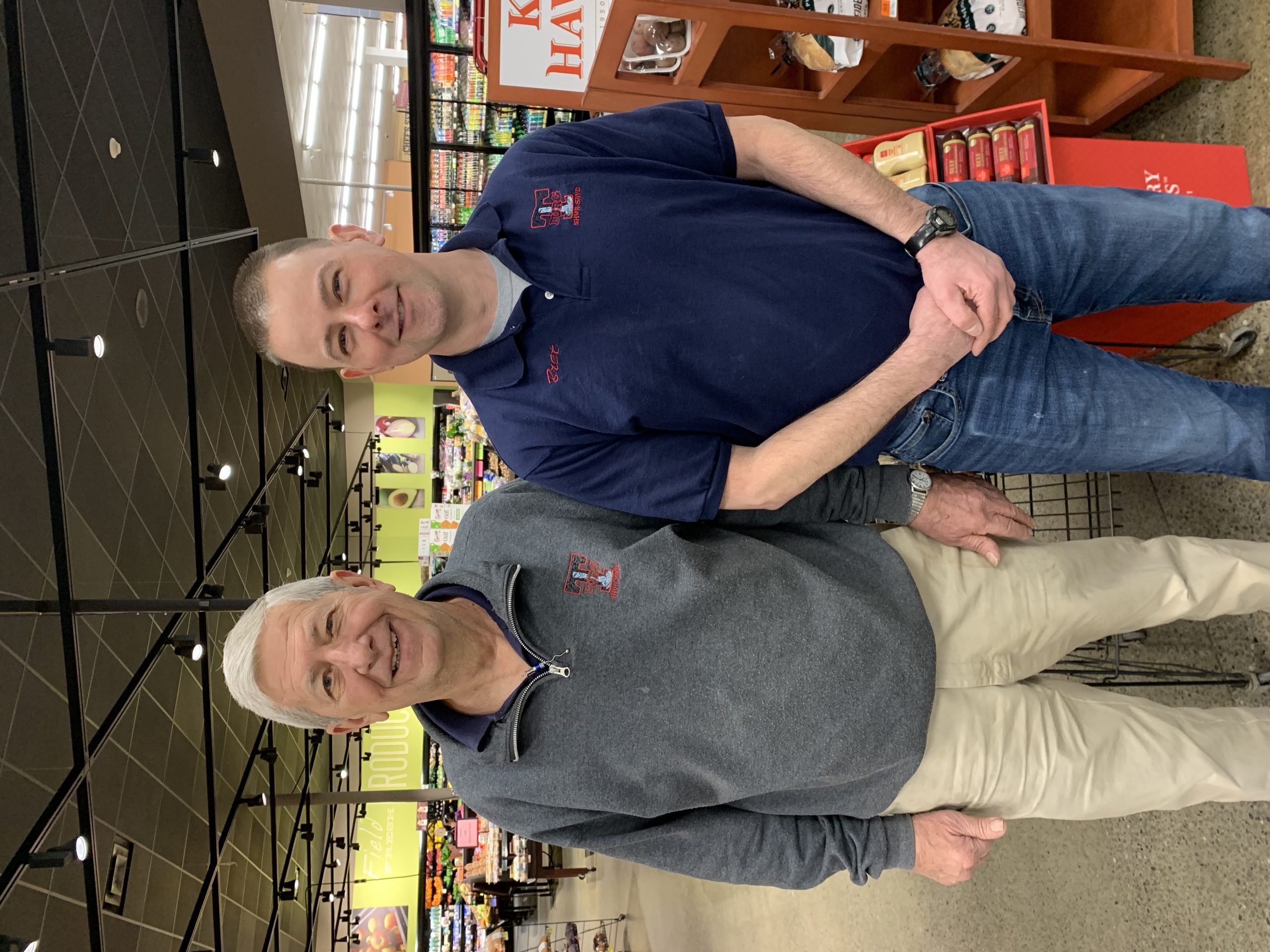 Jim and Bret Seafuse stand in front of their grocery store that has been operated by the Seafuse family for over 41 years.