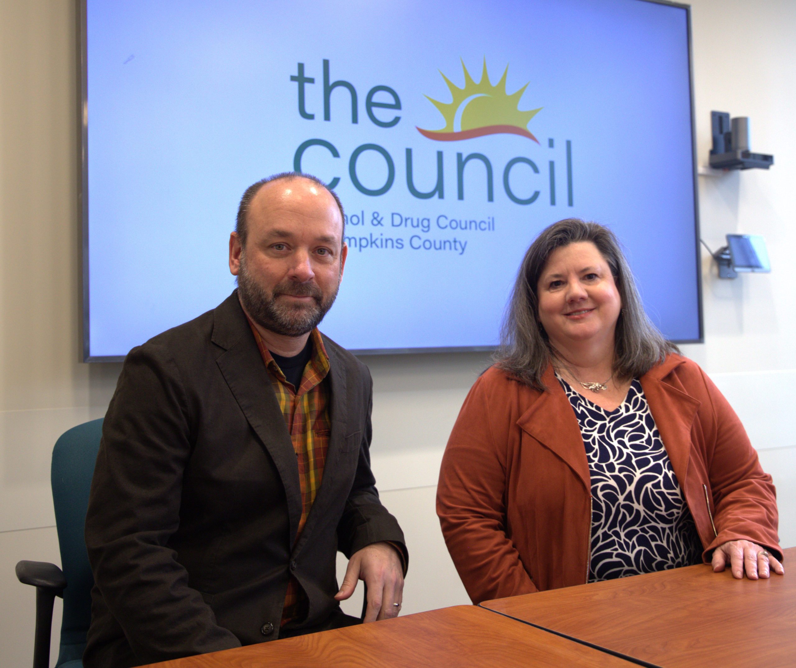 Angela Sullivan, Executive Director and Dr. John-Paul Mead, Medical Director in front of "the council" sign