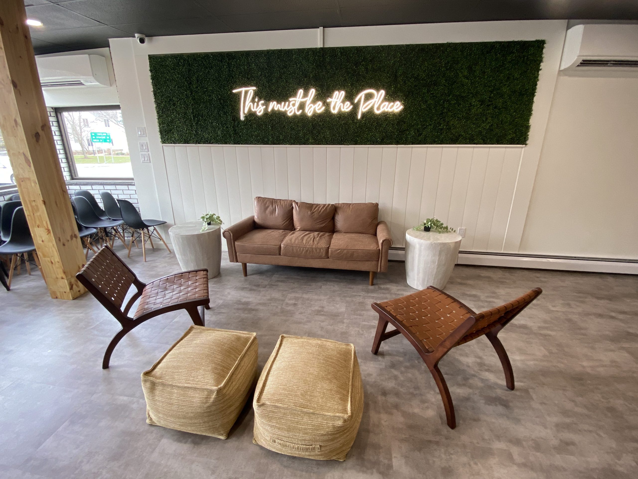 A featured wall and seating area at The Corner Brew, a new coffee shop in the village of Dryden.