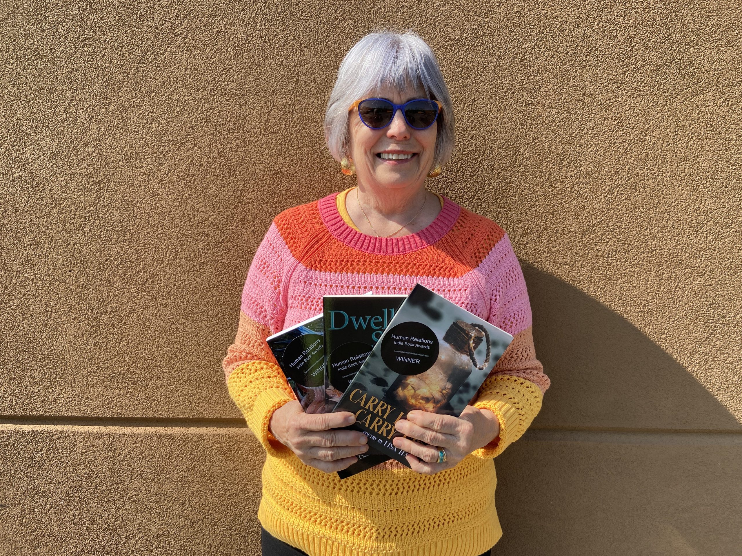 Dryden resident Lisa Harris recently won three gold awards through this year's Human Services Indie Book International competition.