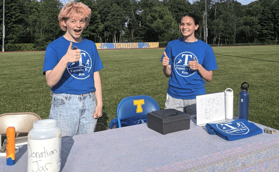 Lee Covell (left) and Izabel LaForge pose at the track used for the Equality  Fun Run at Charles O. Dickerson High School in Trumansburg at last year’s Fun Run.