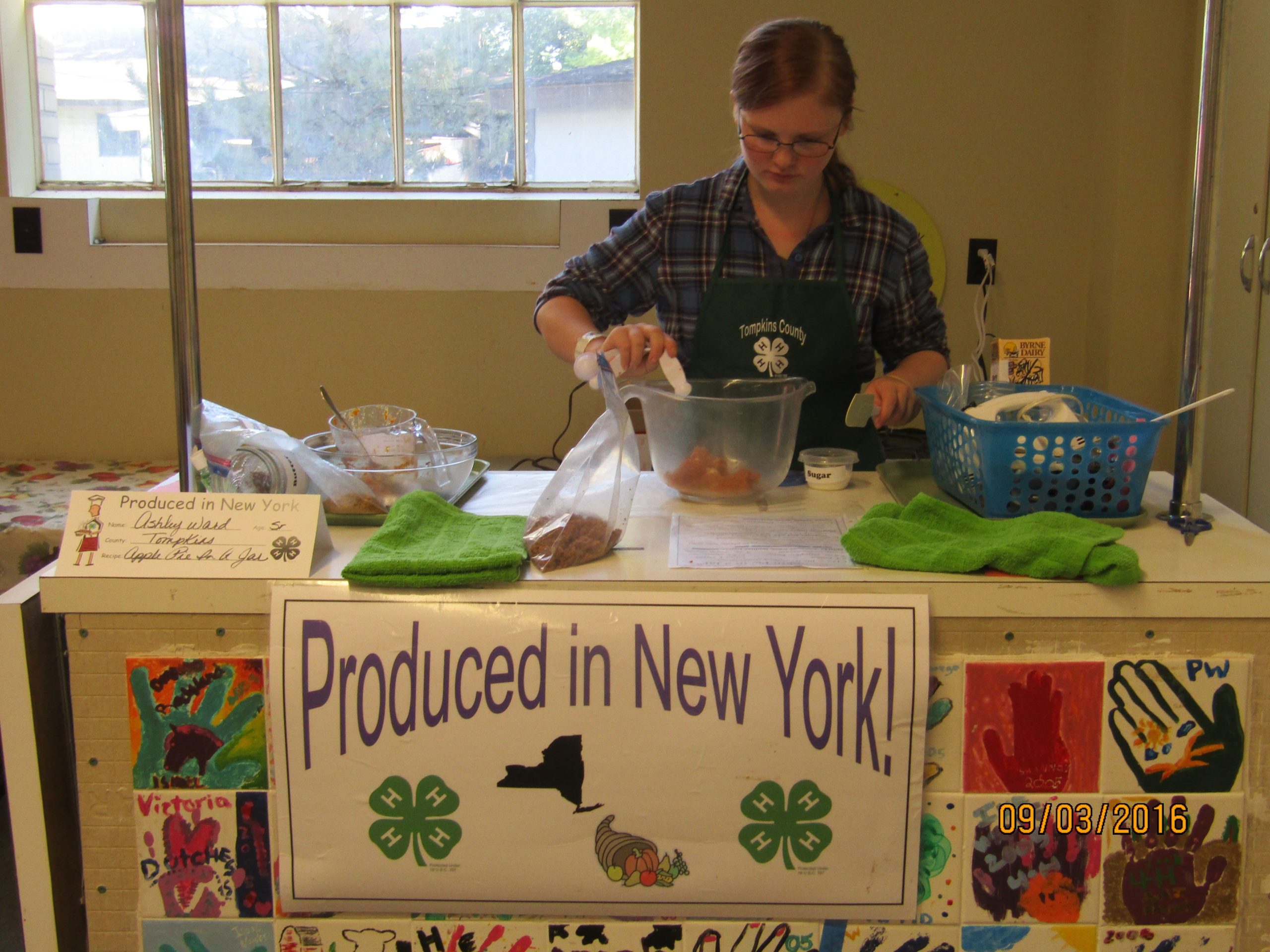 A 4H student participating in a cooking display