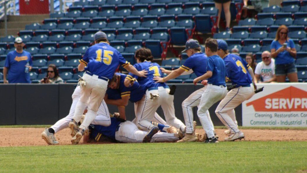 The Lansing baseball team dogpiles Korbin Lovejoy by first base following the Bobcats' 4-3 walk-off win in the NYSPHSAA Class B Regionals against Skaneateles on June 3 at Mirabito Stadium. The Bobcats went on to make their first state championship appearance since 2012, where they would lose to Depew 5-4.