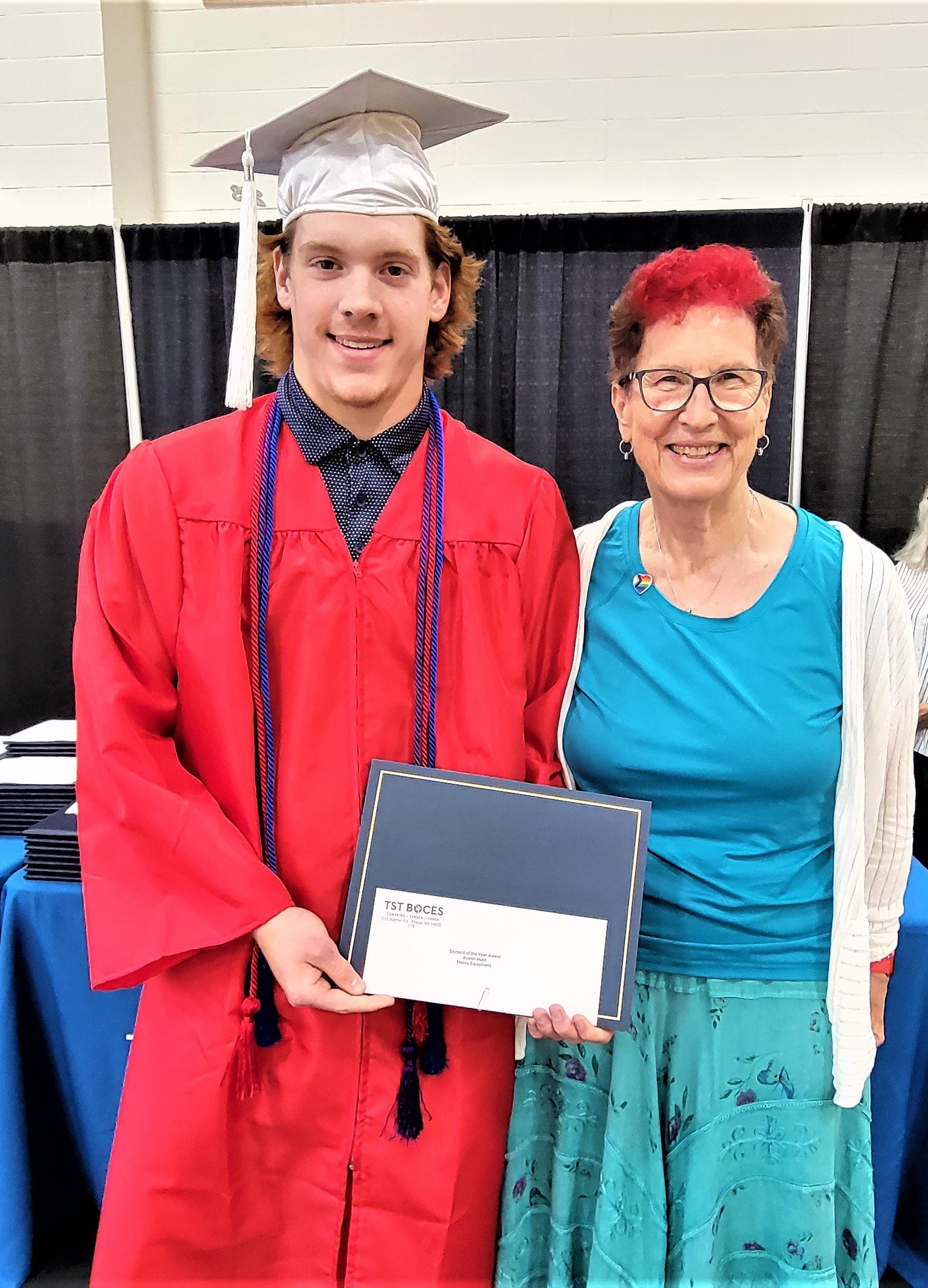 Austin Hunt (left) received The Rotary Club of Ithaca CTE Student of the Year award at the TST BOCES Career & Tech Education Center's annual awards and completer ceremony, presented by Rotary member Linda Pasto, who is also a member of the TST BOCES Board of Education. 
