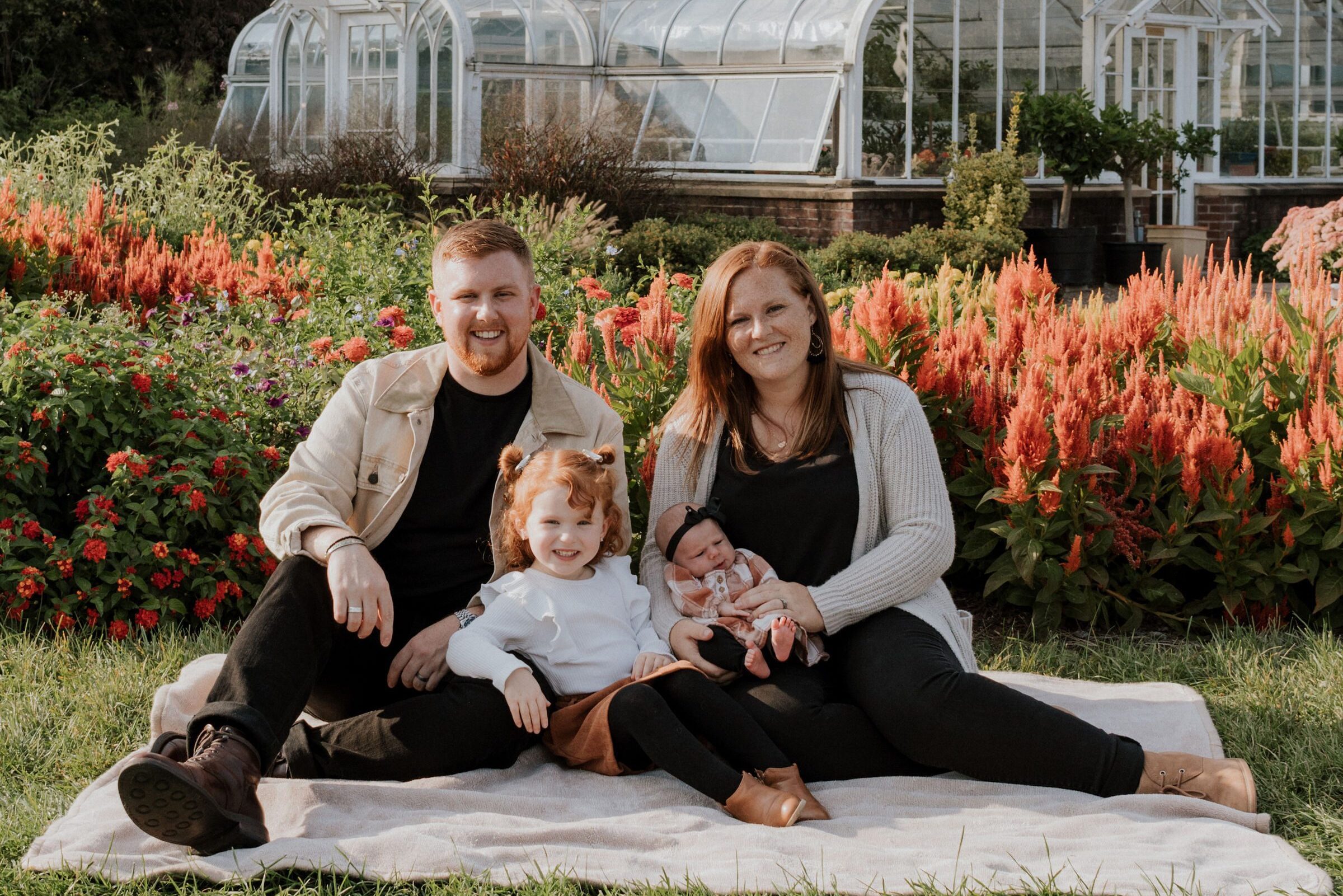 Caption: Pastor Robert Sweatt, his wife Katie, and their daughters, moved to Lansing in May. Sweatt said the family is enjoying rural life.