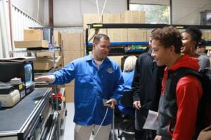 During a TST P-TECH Academy field trip to C&D Assembly Inc. in Groton. The students are, left to right: Malachi Eschler, Julian Pettaway (foreground), Sindiswa Pinckney, The’re’sa Murray.