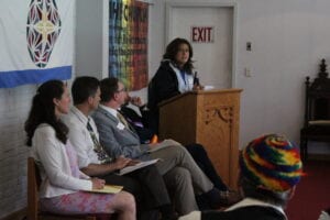 Patricia Rodriguez speaks to the First Congregational Church, offering the support of the Tompkins County Immigrant’s Rights Coalition.