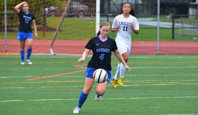 Kyle with a microphone during his radio announcing