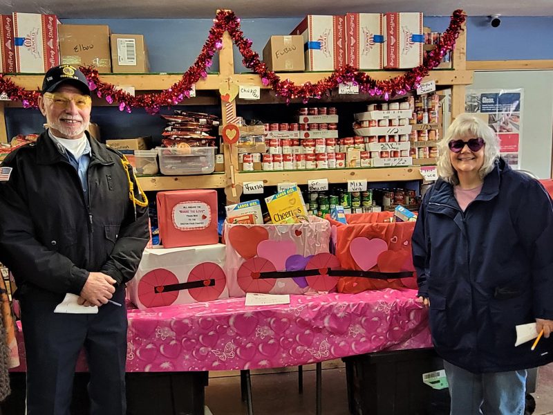 The judges for the Groton Food Providers "Share the Love" food drive contest and the GFP coordinator, Jessamine (Jess) Stone, stand beside the Crossroads Restaurant & Poker League's "train" of boxes, which took the "Best in Show" award. Left to right: Ruth Dilger Williams, Robert (Bob) Yachinich, Pastor Sharon Newman, and Jessamine (Jess) Stone, Groton Food Providers coordinator.