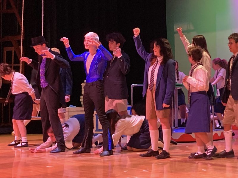 The cast of Lansing High School’s production of “Roald Dahl’s Matilda: The Musical” perform “When I Grow Up” during rehearsal Feb. 23.
