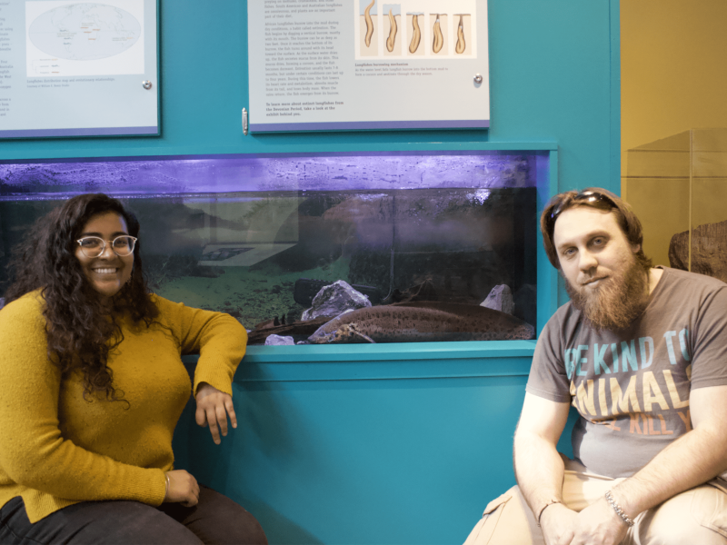 Shyia Magan (left) and Chris Wolfe (right) with Tembea, the new addition to the Museum of the Earth's Devonian Period exhibit.