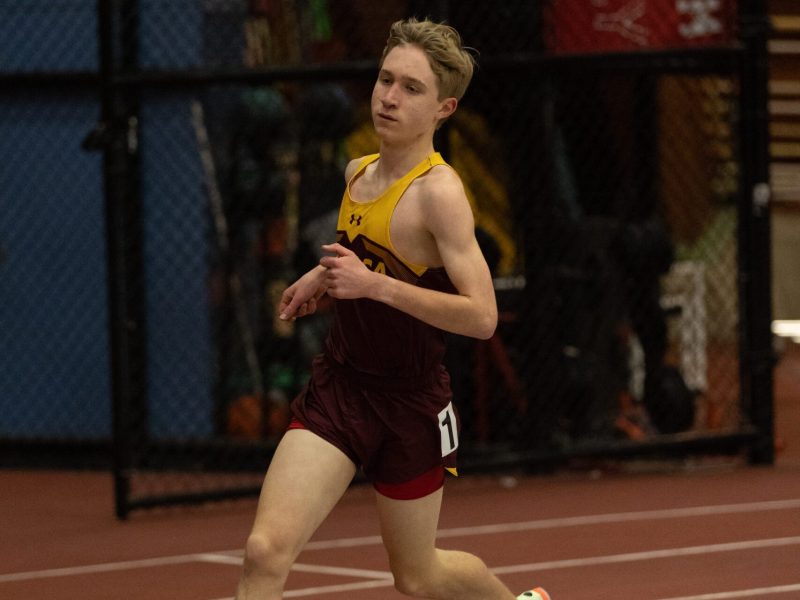 Ithaca High's Crosby Woods takes part in the 1,600-meter run at the 607 Invitational on Jan. 4 at SUNY Cortland. Ithaca High track and field at SUNY Cortland.