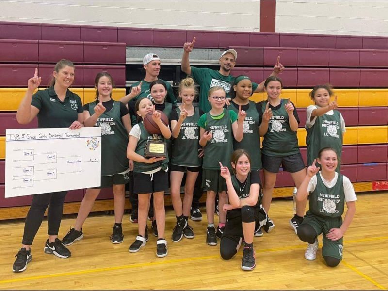Newfield Rec girls team and three coaches