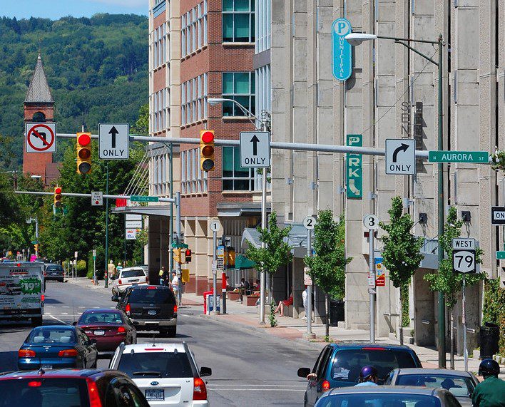 Seneca Street traffic in Ithaca on a clear day