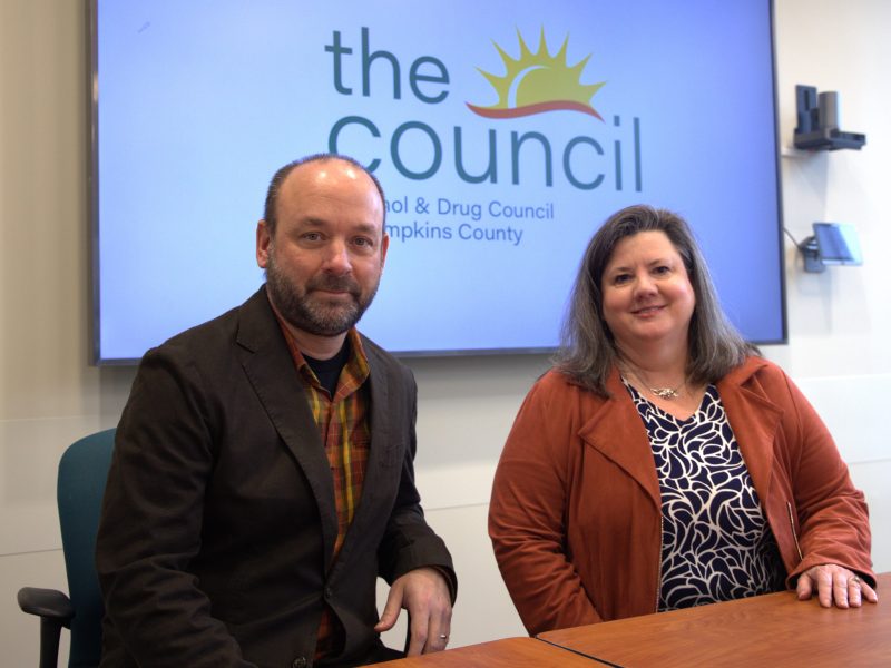 Angela Sullivan, Executive Director and Dr. John-Paul Mead, Medical Director in front of "the council" sign
