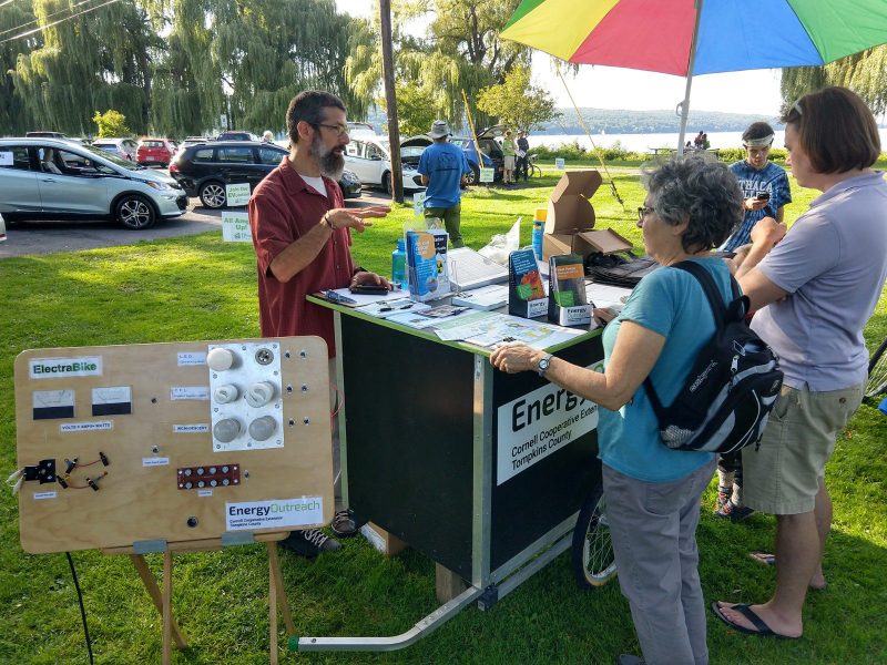 residents at booths during an environment event