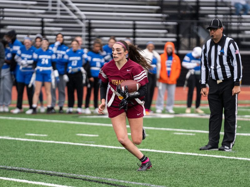Ithaca's Ainslie Reimer runs the ball during the Little Red's season opener against Horseheads on May 18. Reimer is part of an ever-growing team that continues to excel in its second year of existence.