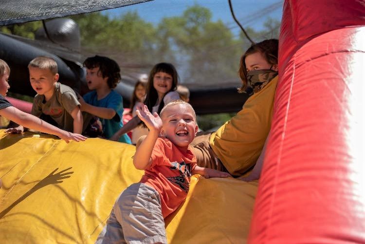 child in a bouncy castle
