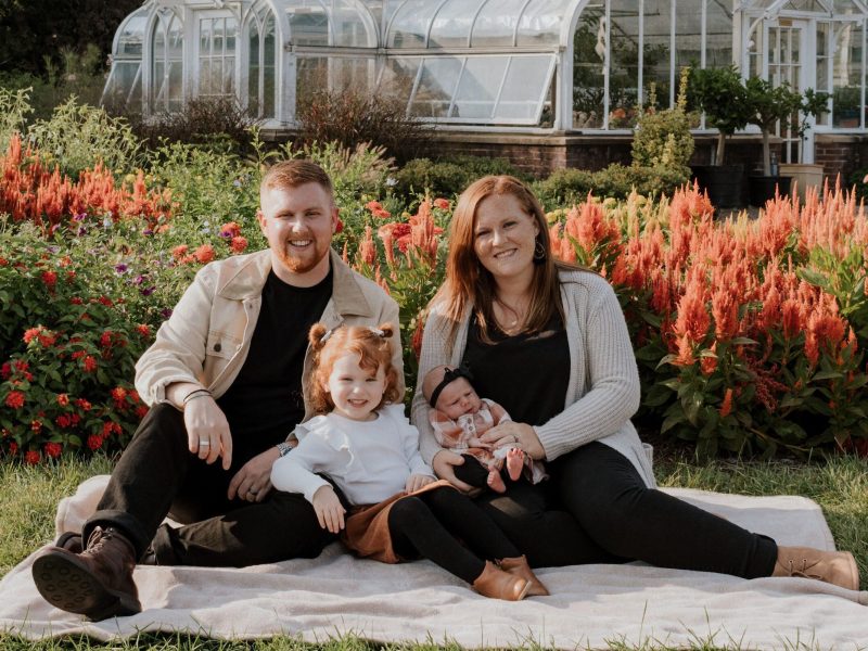 Caption: Pastor Robert Sweatt, his wife Katie, and their daughters, moved to Lansing in May. Sweatt said the family is enjoying rural life.