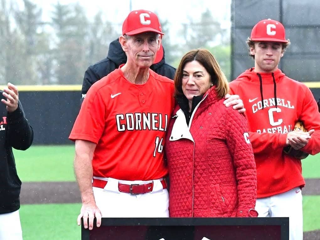 Photo by Anika Kolanu/Cornell Athletics
Tom Ford (left) poses with his #14 jersey alongside his wife Kristen (right). Ford concluded his 35th and final season coaching the Cornell baseball team, having been the head coach from 1991 to 2008 and the associate head coach since 2008.