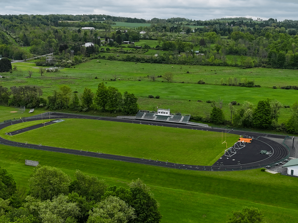 Construction on the track and field area of Newfield Central Schools will conclude by the end of the summer. The track will be resurfaced, and new fencing will be installed.
