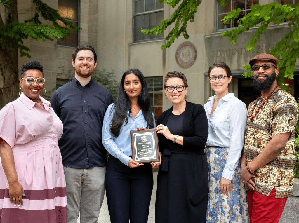 Photo caption:
Campus Community Leadership Award winner Netra Shetty ’25 (center-left) poses with (from left) Marla Love, the Robert W. and Elizabeth C. Staley Dean of Students; Alec Brown, program manager of the Hunter R. Rawlings III Cornell Presidential Research Scholars Program; Monica Yant Kinney, interim vice president for university relations; Sarah Bartlett, volunteer and outreach manager at the Ithaca Free Clinic; and Taili Mugambee, lead program coordinator of Ultimate Reentry Opportunity, outside of Day Hall on May 14.