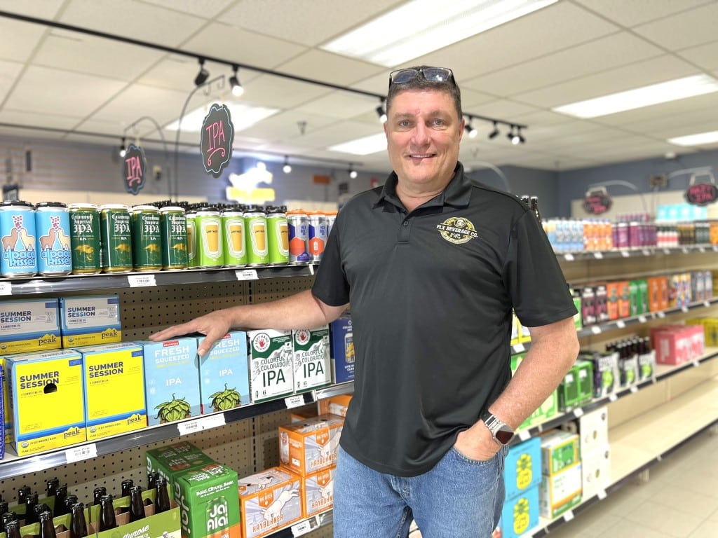 Photo by Jaime Cone Hughes 
Chris Hass, owner of FLX Beverage Co., opened the store on W. State Street in late May. 