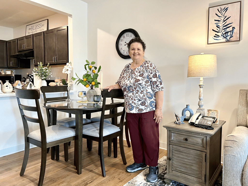 Photo by Jaime Cone Hughes 
Maria Vakkas in her new Village Grove apartment in Trumansburg. 