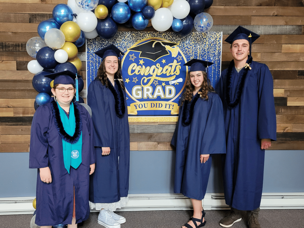 Photo by Linda Competillo
The Groton Assembly of God church hosted its first-ever Homeschool Graduation Ceremony, at which four students comprised the Class of 2025. Pictured left to right: Autumn Lanzilotta, Brooke Ostrander, Hannah Wright, Bailey Wright.