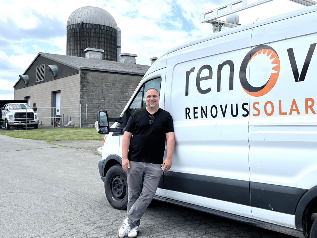 Photo by Jaime Cone Hughes
Joseph Sliker, president and CEO of Renovus Solar, stands in front of the company’s new building on Sheffield Road. It currently houses office space for all of Renovus’ employees and is also the new home of Standard Battery. Renovus Solar Expansion