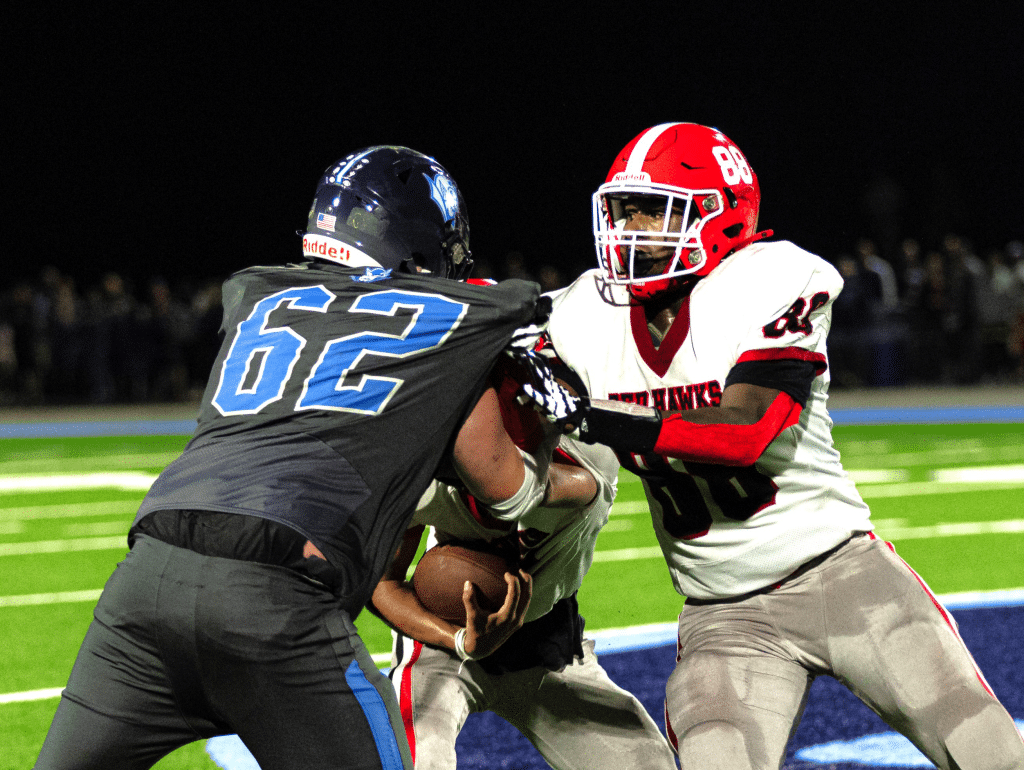 Photo by John Brehm
Groton's Carmelo Riley-Israel (right) blocks Scott Raymond (left) during a September 27 game against Moravia. Riley-Israel will be continuing his career at Hilbert College, joining a relatively-new program that will be entering its fourth year of existence.