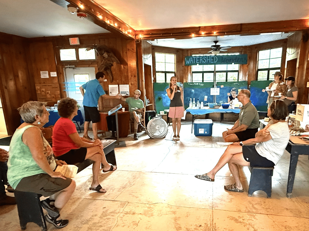 Photo by Robert Ross
Astrid Jirka from Discover Cayuga Lake speaks to the audience at the Watershed Internship Program Final Event: Love Your Lake Fest.