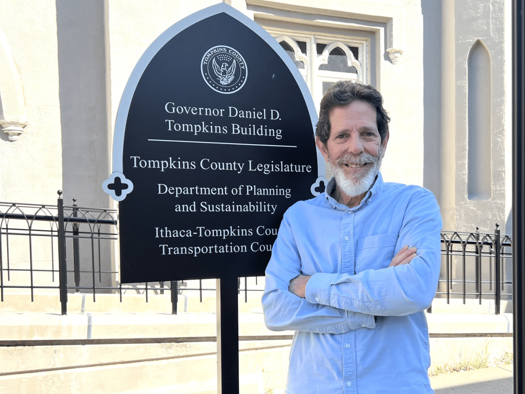 Photo by Jaime Cone Hughes
Fernando De Aragón outside the Ithaca Tompkins County Transportation Council offices on East Court Street in Ithaca.