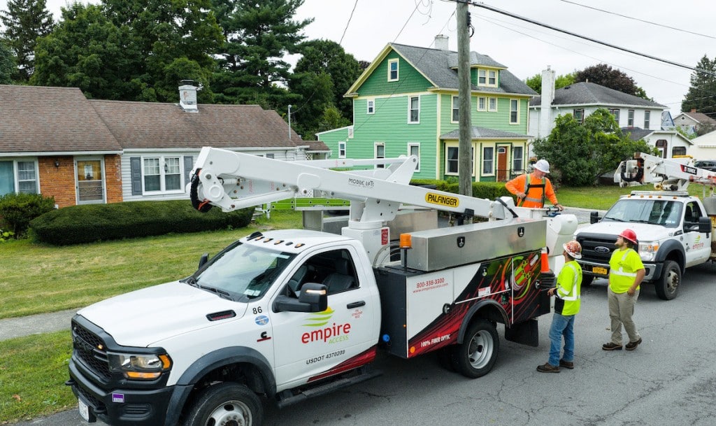 Photo provided
Empire Access's service vehicles in a local neighborhood. 