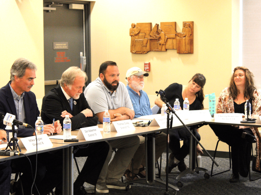 Photo provided
From left to right: Tompkins County Legislature candidates Mike Sigler, Dan Wakeman, Thomas Corey, Greg Mezey, John Hunt, Michelle Wright and Christy Bianconi at a forum focused on affordability issues.     