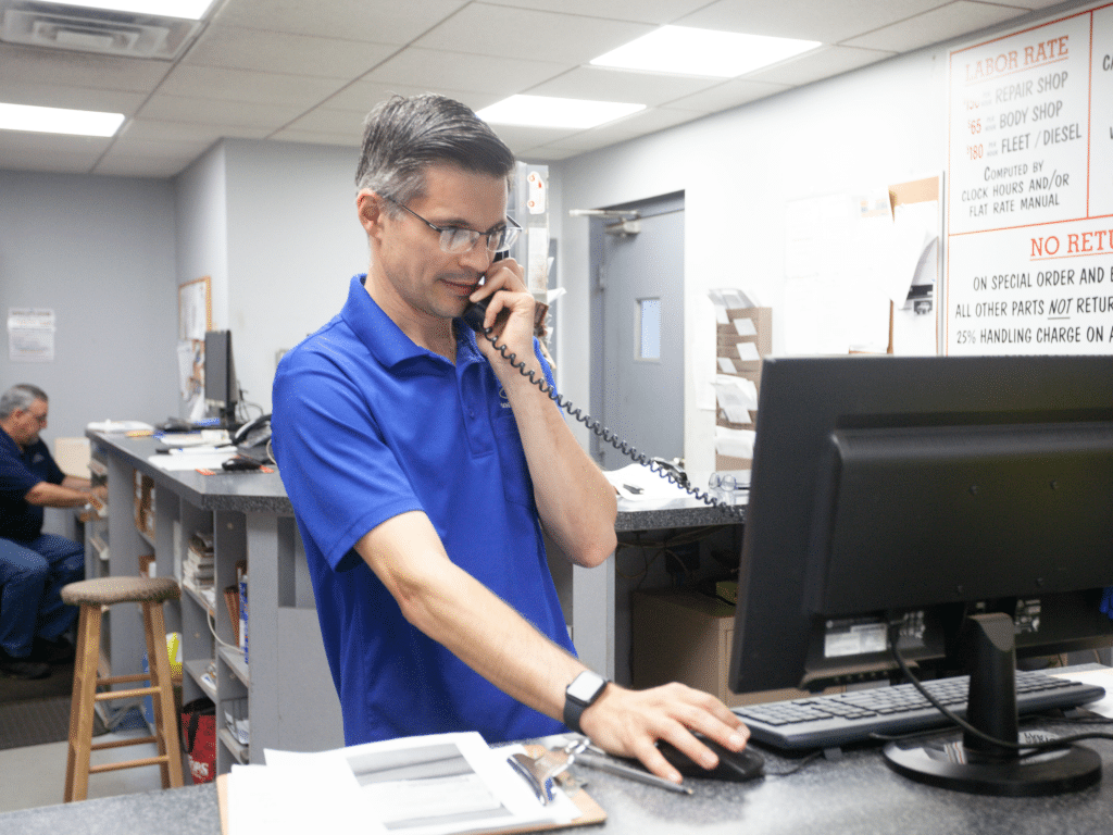 Jesse Dovi:
Photo provided Jesse Dovi speaking with a customer regarding a service appointment at their Ford dealership in Cortland.