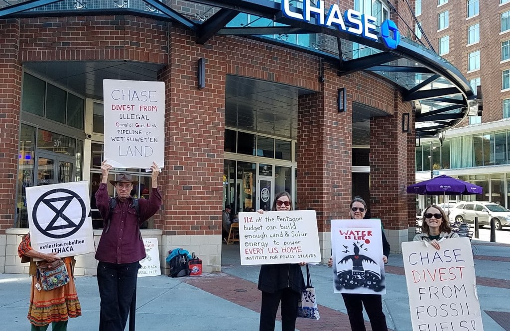 Photo provided
Protestors stand at Chase Bank in Ithaca.