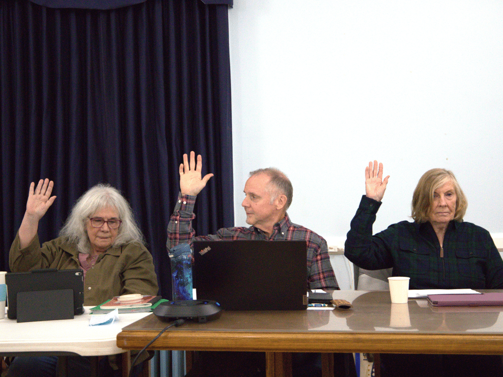 Photo by J.T. Stone
From left to right: Newfield town board member Joanne James, Town Supervisor Mike Allinger and town board member Casey Powers vote to approve the town’s 2026 preliminary budget during their Oct. 9 meeting at the Masonic Temple. 
