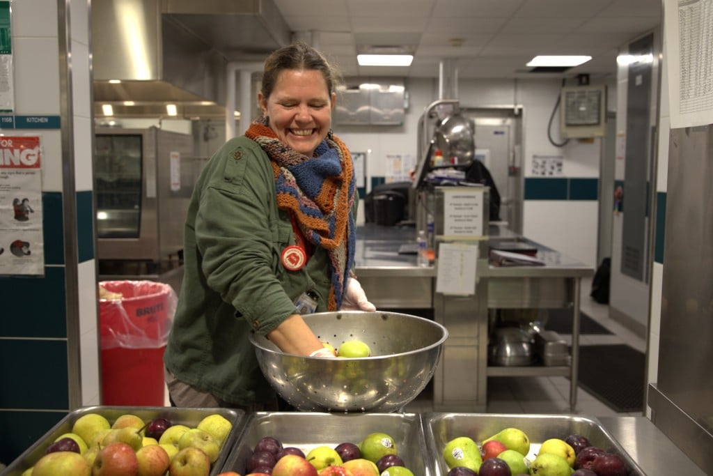 Photo by J.T. Stone
Laurie Pattington, Newfield Central School District's farm-to-school teacher, prepares apples in the Newfield High School cafeteria. 
