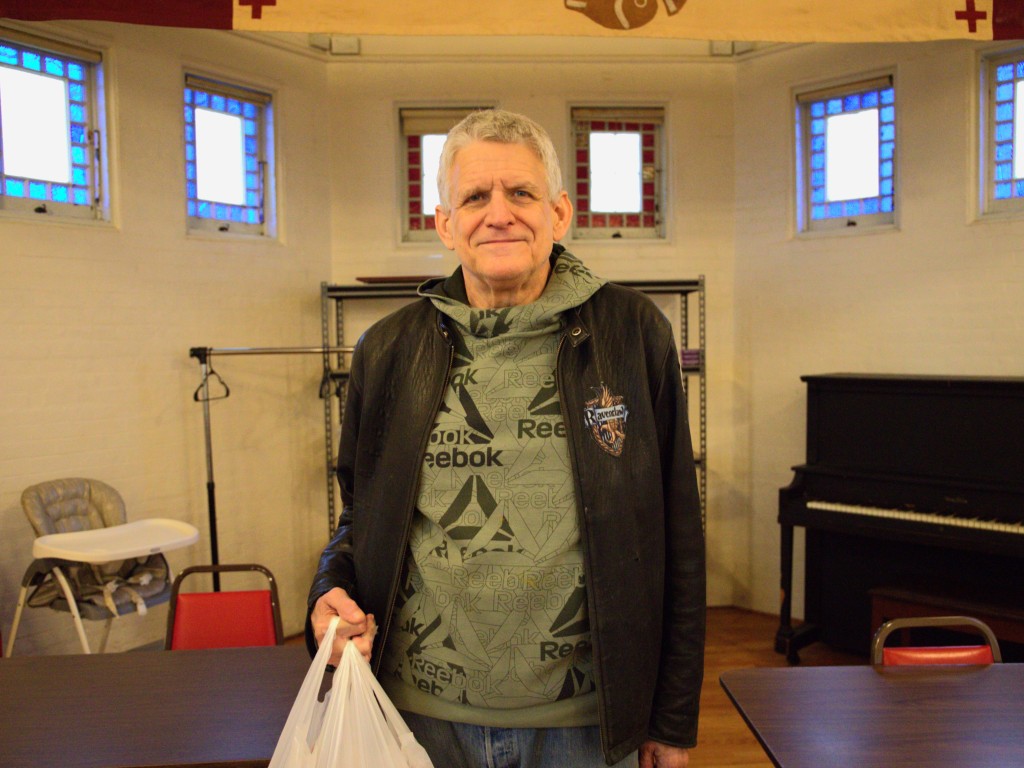 Photo by J.T. Stone
Ithaca resident Dwane Smith at Loaves and Fishes, a community kitchen located in St. John's Episcopal Church in Ithaca. Smith is one of about 7,200 people in Tompkins County who rely on the Supplemental Nutrition Assistance Program, or SNAP, among other social services, to support their basic needs. 
