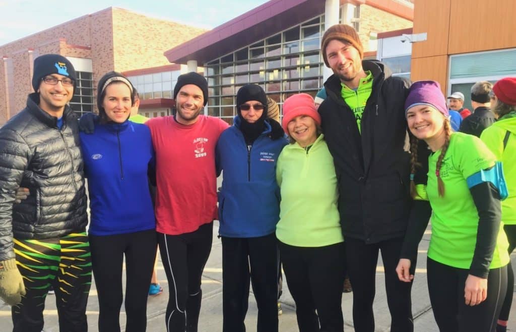 Photo provided 
Local runner Jay Hubisz (third from the right) with (left to right): Jay’s wife Melissa, brother-in-law Drew Perrin, mother-in-law Jane Leff, father-in-law Joel Leff, Sadie Perrin and Kesh Rao at a previous Ithaca Turkey Trot. The race begins every year at Ithaca High School. 