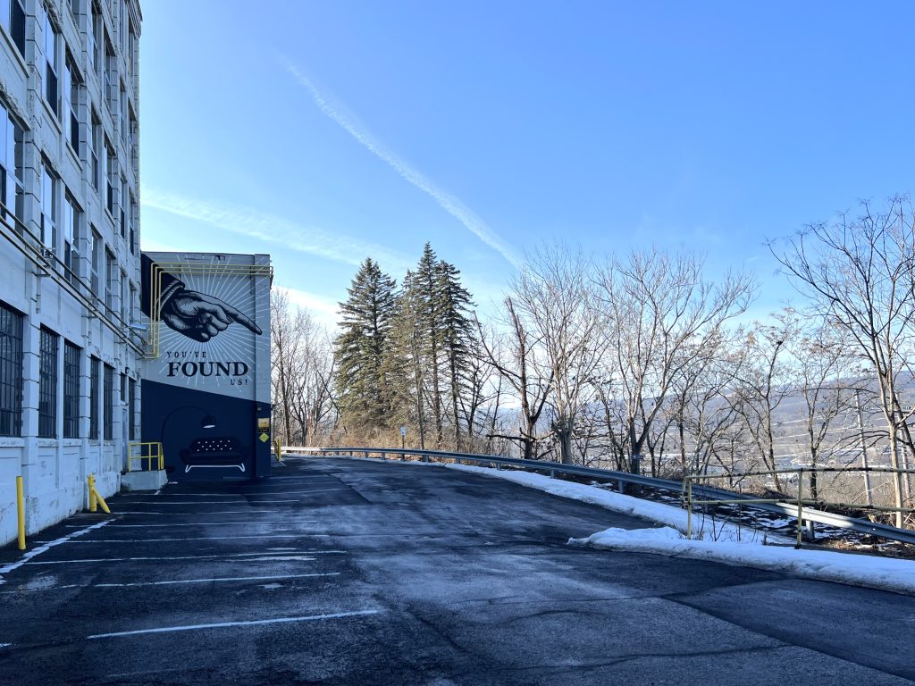 Photo by Jaime Cone Hughes 
The brief drive through SouthWorks to FOUND in Ithaca involves passing under a bridge and driving by a colorful mural walk and includes sweeping views of the city. 